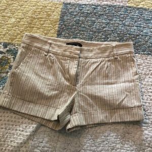 Super cute cream with tan color detail BCBG shorts